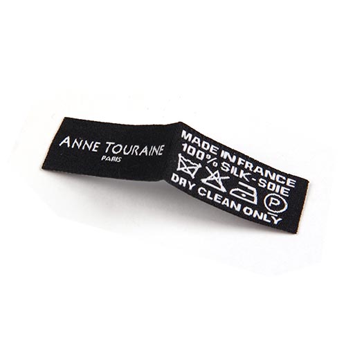 black woven label with white logo